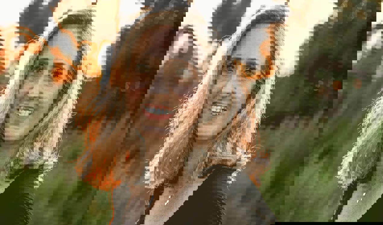 cinclus pharma blond woman smiling to the camera in the sunset