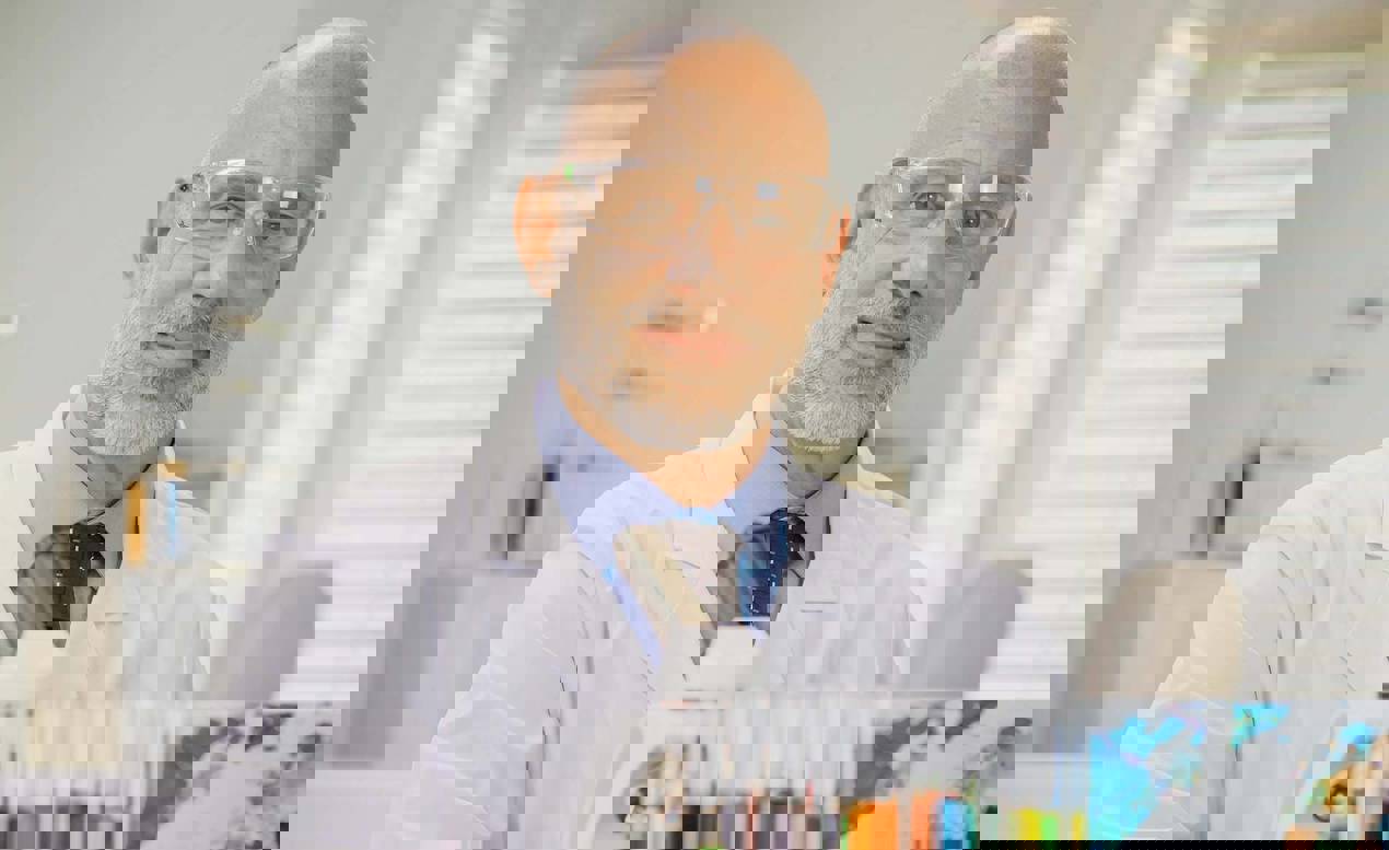 cinclus pharma male scientist looking in to camera smiling