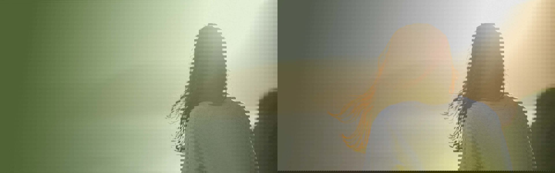 cinclus pharma header woman watching sunset over the ocean