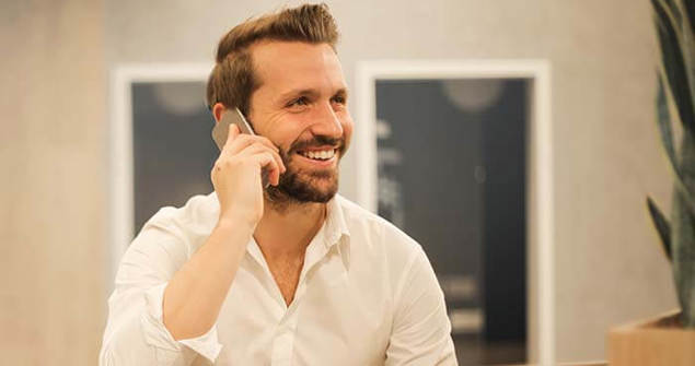 cinclus pharma man smiling while talking on the phone