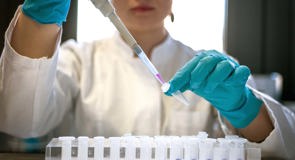 cinclus pharma female scientist working with pipette in lab