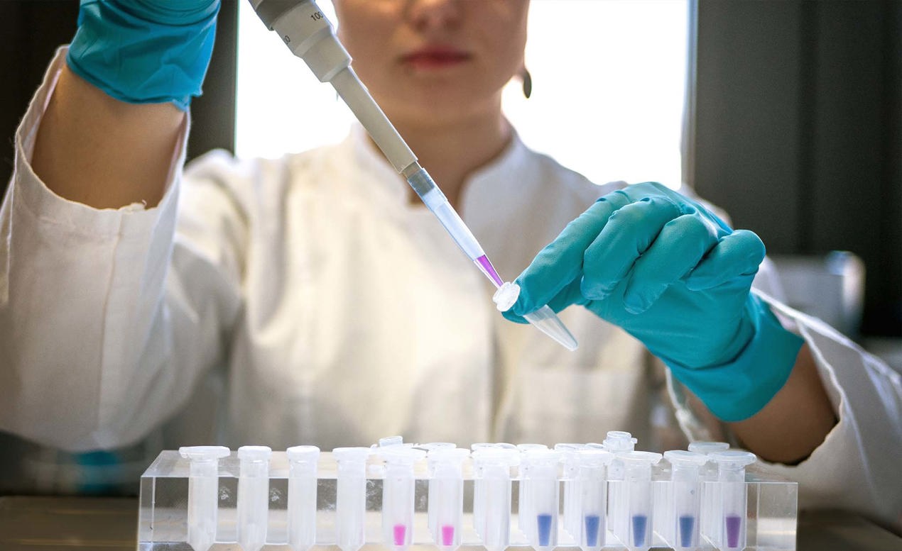 cinclus pharma female scientist working with pipette in lab